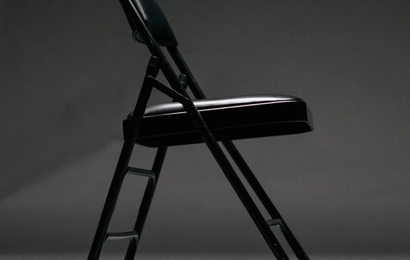 Vintage-style tubular black chair with a sleek metal frame